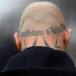 Swiss neo-Nazi who spat on Jew jailed for two years