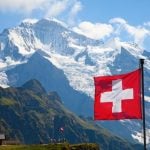 Largest Swiss flag in the world damaged by torrential rain in the Alps