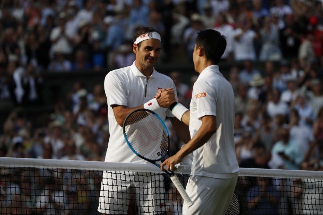 Federer pockets 100th win at Wimbledon