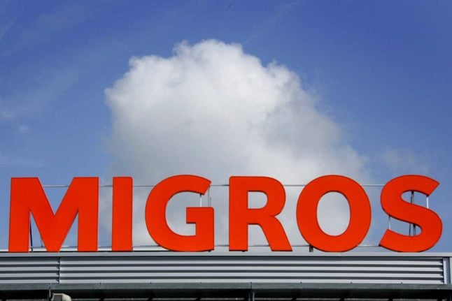 The familiar orange lettering of Swiss supermarket chain Migros