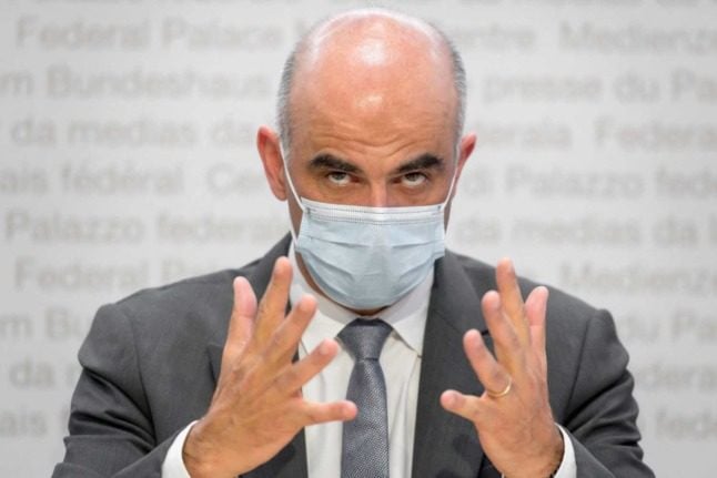 Swiss Health Minister Alain Berset announces a change in the country's Covid-19 health pass rules. Photo: Fabrice COFFRINI / AFP