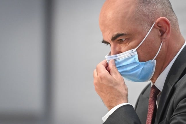 Swiss Interior and Health Minister Alain Berset gestures during a press conference after a meeting of the Swiss government in Bern, on April 14, 2021. - As much of Europe buckles down against a third wave of coronavirus (Covid-19) infections, Switzerland announced on April 14, 2021 it would significantly ease Covid-19 restrictions despite a worsening situation. As of next week, Swiss restaurants and bars, which have been closed since December, will be permitted to open outdoor seating areas, the government said. (Photo by Fabrice COFFRINI / AFP)