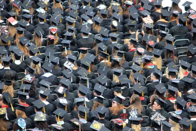 A sea of black graduating hats