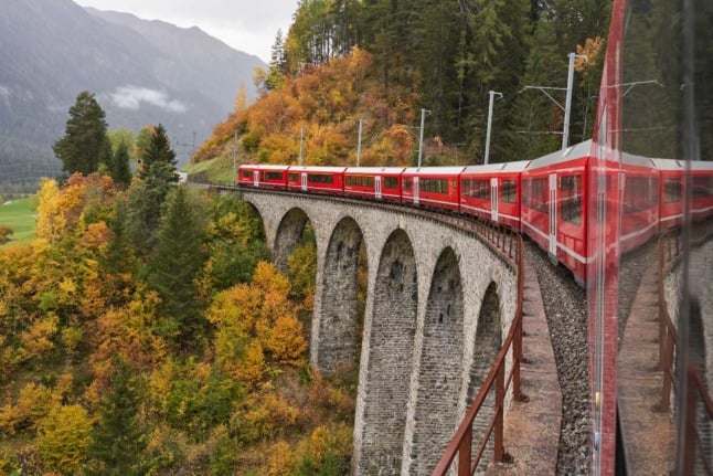 A train weaves its way through Albula, Bergün/Bravuogn, in Switzerland. 