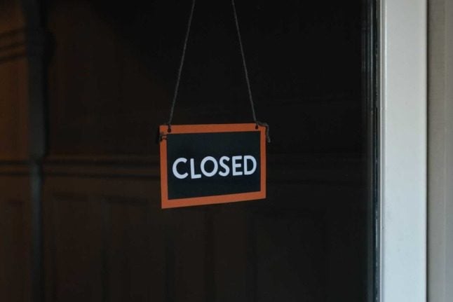 A closed sign in a window